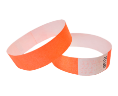Coral red Tyvek wristbands without print with security adhesive
